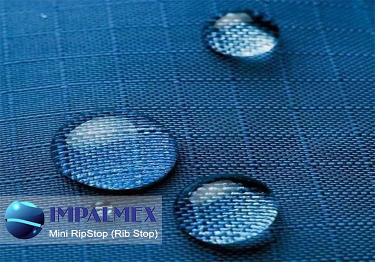 Mini Rip Stop de poliéster con entramado reforzado, superficie mate y colores vivos; perfecta para botiquines, fundas y morrales.